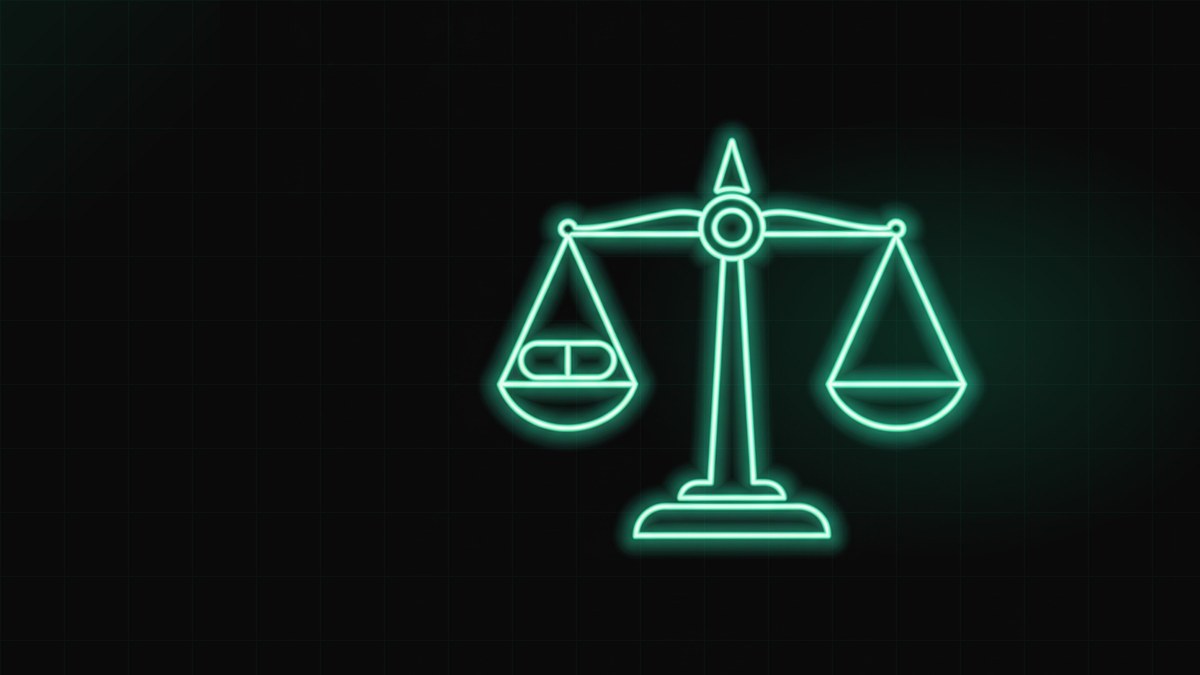 Glowing balanced scales of justice with a pill capsule resting on one pan, illustrating drug crime defense marketing